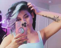 She has a big tattoo on her wrist.